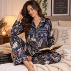 woman holding a mug wearing personalized haunted library halloween pajamas