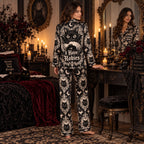 woman reading a spell book in black cat Halloween satin pajama set