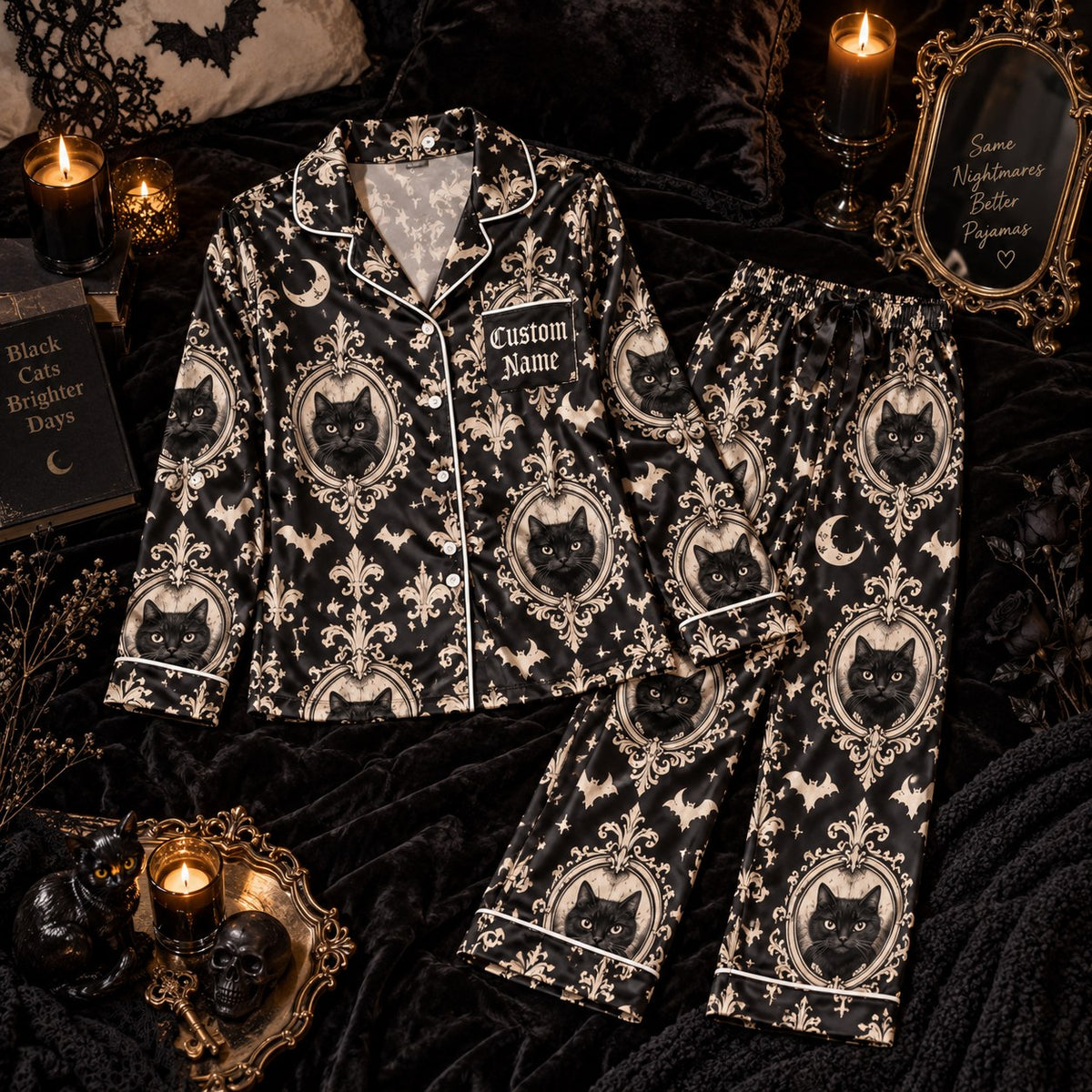 black cat damask satin pajamas flat lay with a custom name on the chest