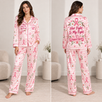 woman wearing pink breast cancer awareness satin pajama set