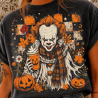 graphic tee featuring Pennywise clown in a ruffled collar and plaid scarf