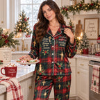 woman sitting with cocoa wearing personalized plaid christmas pajamas
