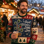 woman hanging a gold bauble on a christmas tree while wearing a