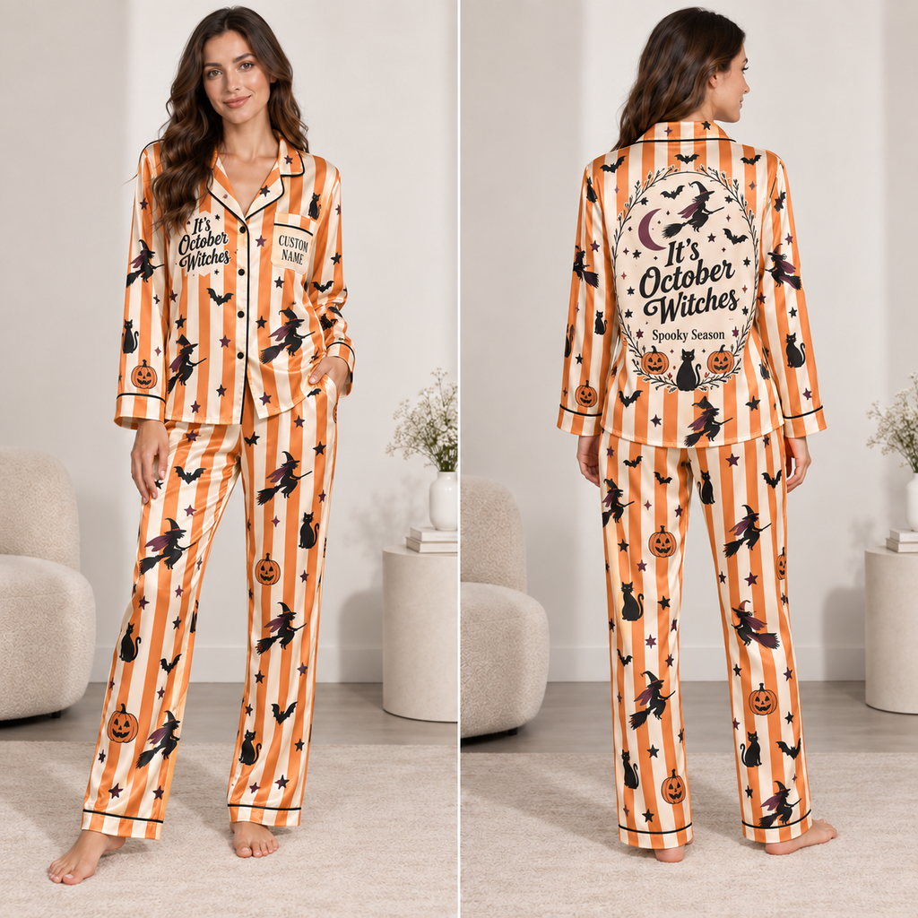 woman wearing orange striped halloween satin pajama set