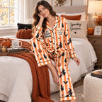 back of satin pajama shirt showing its october witches spooky season design