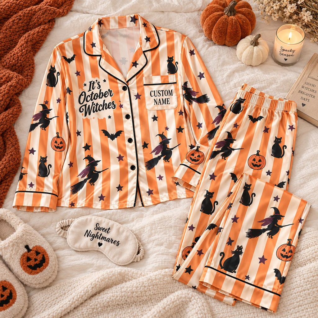orange striped witch satin pajamas flat lay with a custom name on the chest
