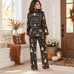 satin pajama set shown on a window bench with autumn decor