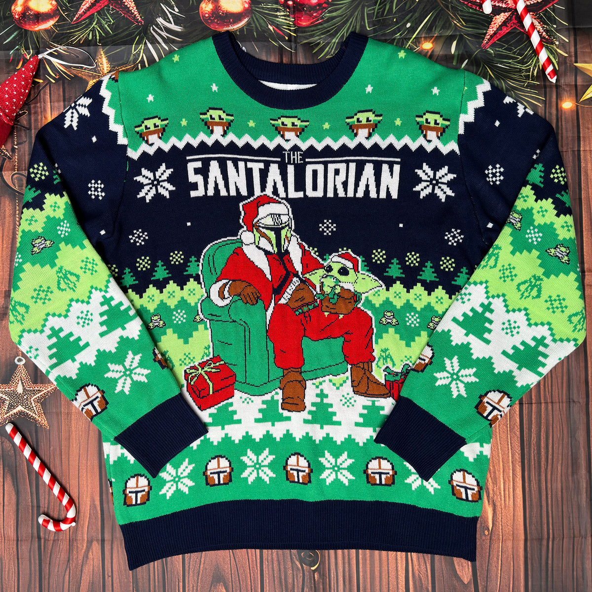 back view of knitted mandalorian and grogu christmas sweater in green and