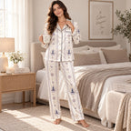 back view of cream satin pajama set showing large meditation figure centered