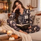 haunted castle crescent moon print on halloween satin pajamas by window