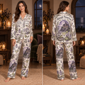 halloween pajamas model wearing midnight margaritas satin set in living room