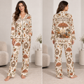 woman modelling personalised halloween satin pajama set with parasol and skull print