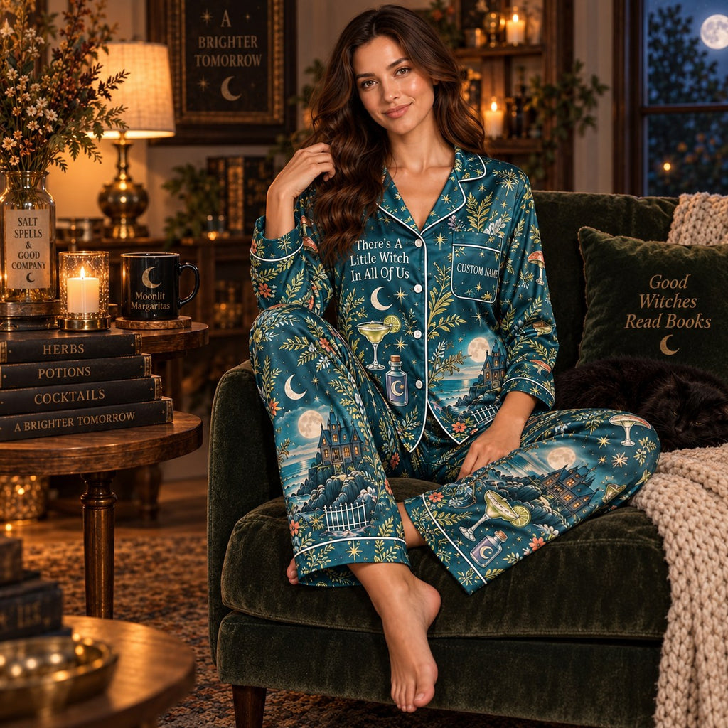 seated woman in teal moon satin pajamas with a custom name on the chest