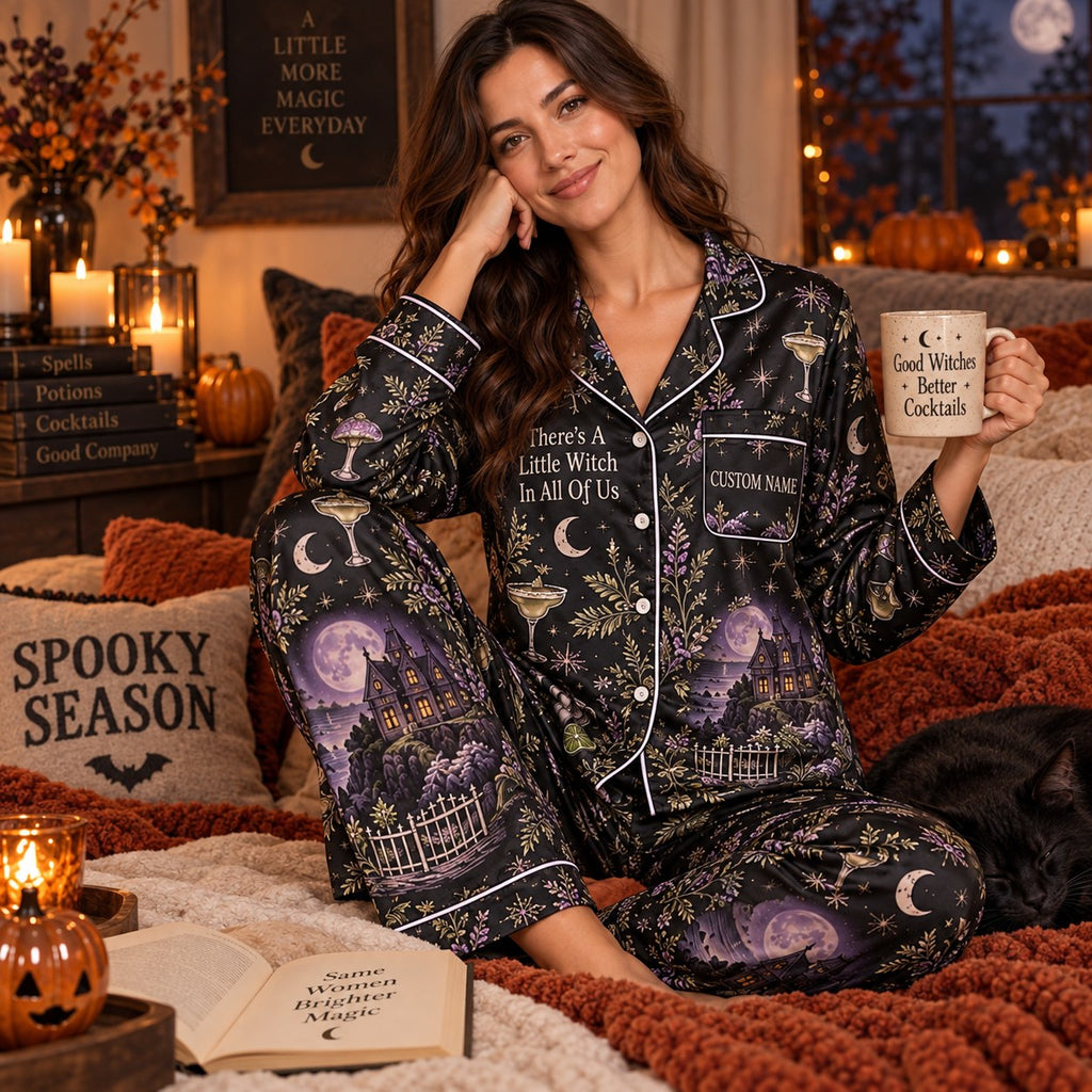 woman holding a mug while wearing the all-over print halloween witch satin