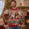 man wearing an ugly christmas sweater with santa and holding beer cans