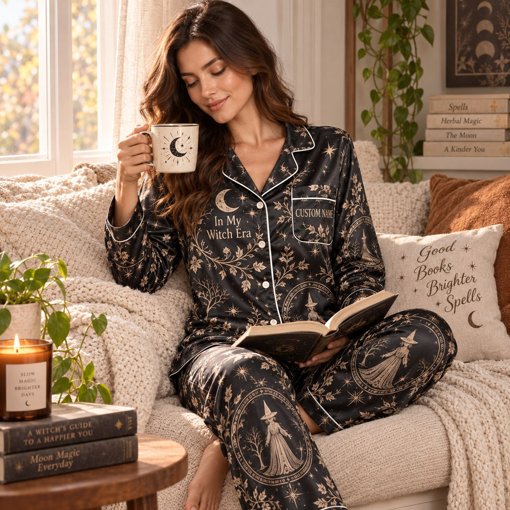 model holding a mug in Halloween witch satin pajamas