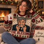 woman holding mug in ugly christmas sweater featuring clark griswold the blessing