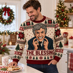 man in kitchen wearing griswold ugly christmas sweater with the blessing banner