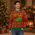 man modelling a red ugly christmas sweater with a station wagon carrying