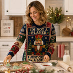 woman decorating cookies in a nutcracker printed holiday sweater