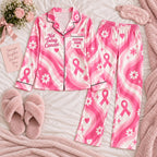 flat lay pink wavy ribbon satin pajamas with a custom name on the chest