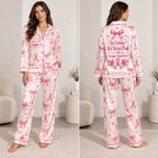 woman modeling a pink plaid satin pajama set with breast cancer ribbon
