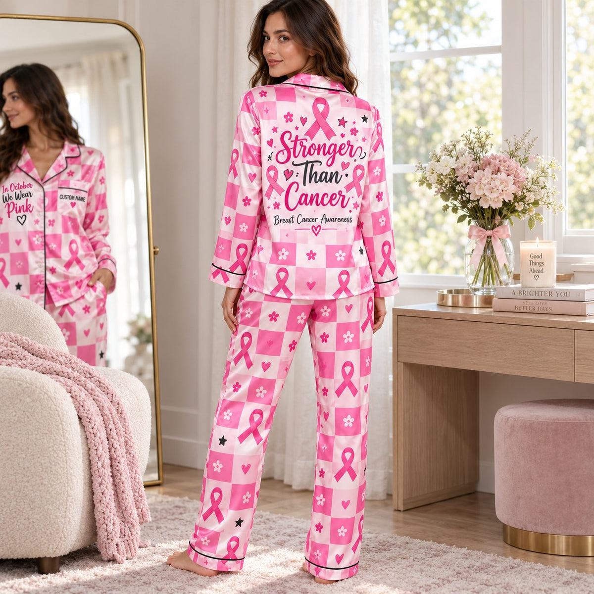 satin pajama set in bedroom setting with pink awareness month print