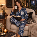 bedroom scene of a model wearing personalised halloween satin pajamas with matching