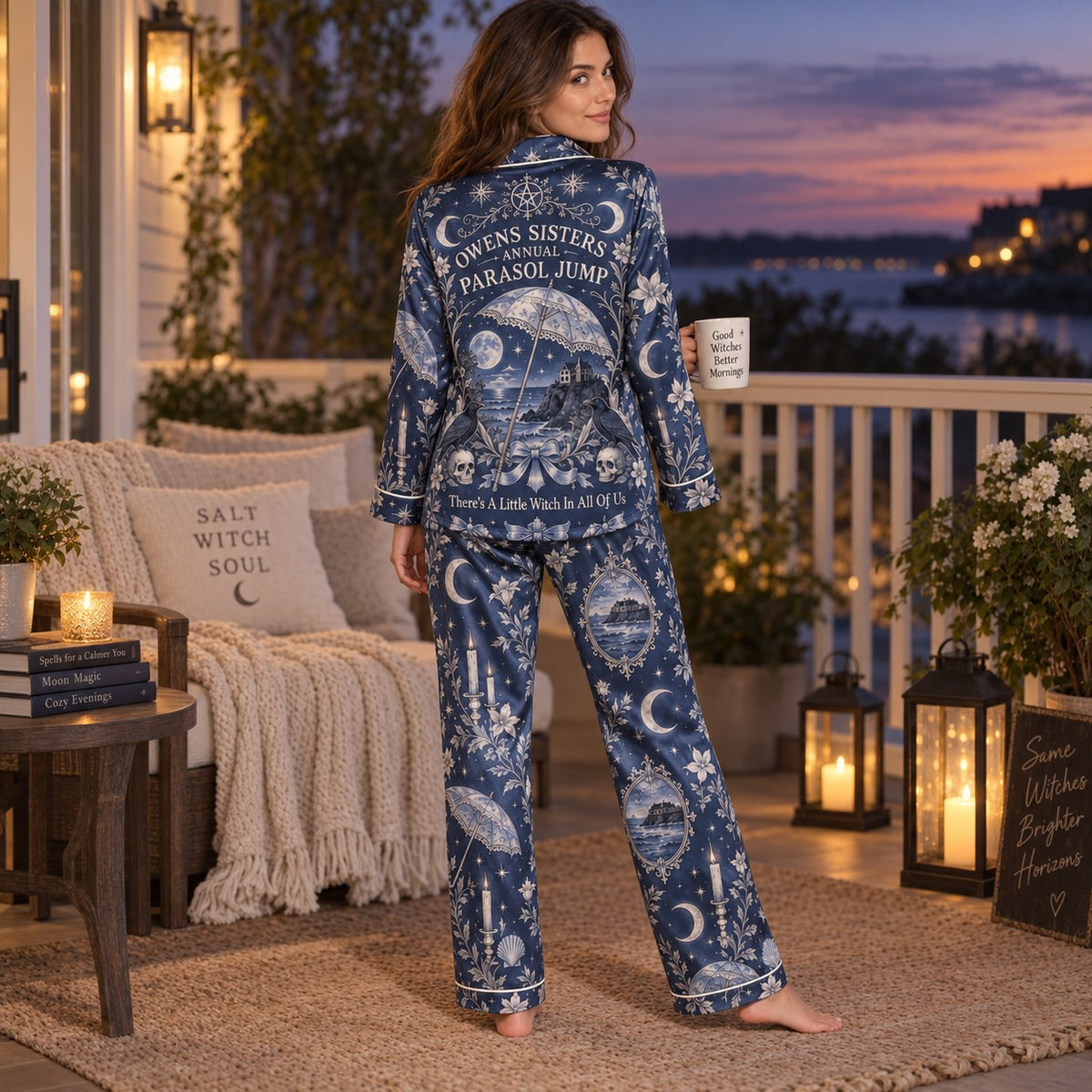 a model in personalised halloween satin pajamas curled up