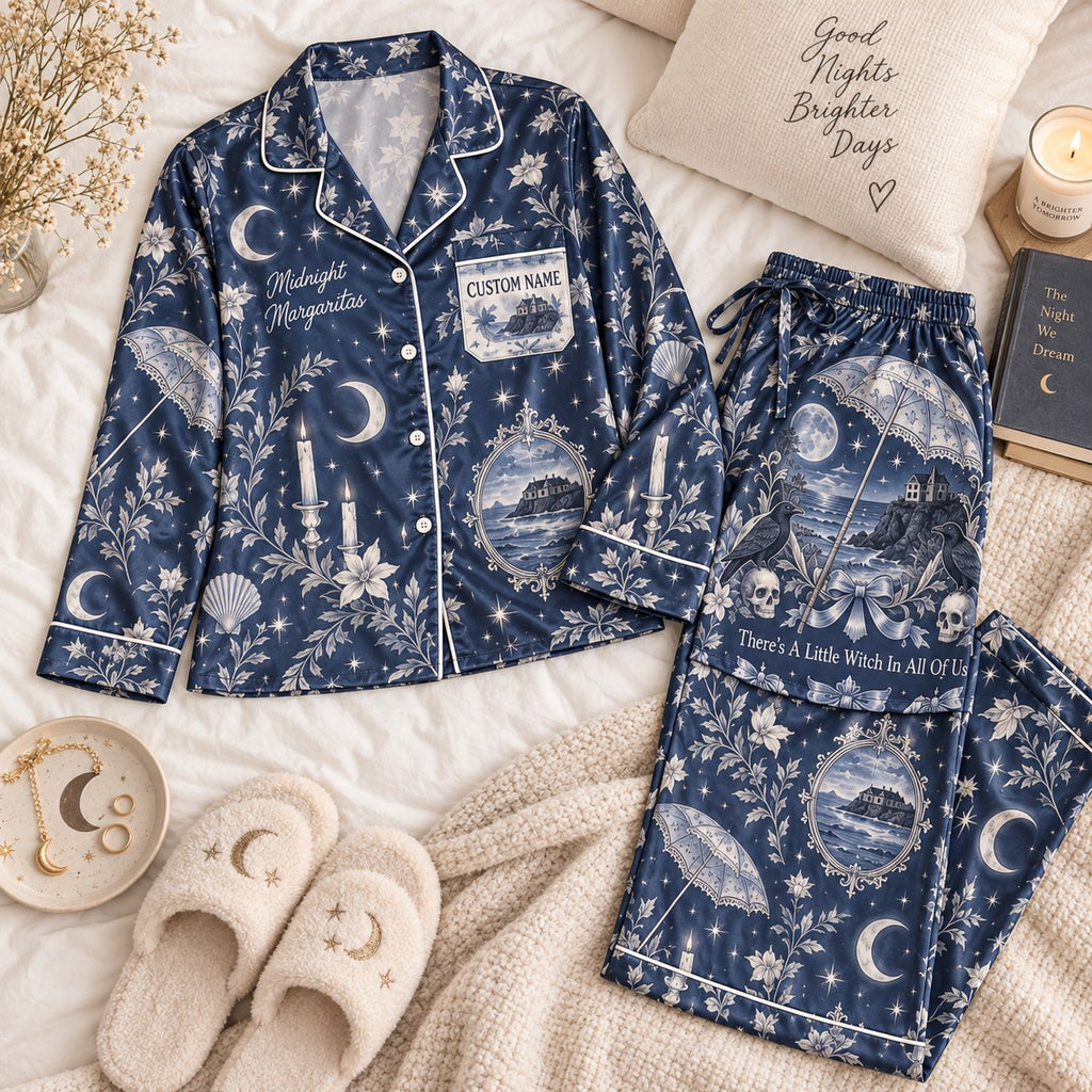 navy moon print satin pajamas flat lay with a custom name on the chest
