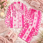 pink checker stripe satin pajamas flat lay with a custom name on the chest