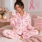woman sitting on bed holding Stronger Than Cancer mug