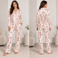 woman modeling pink ribbon satin pyjamas front view