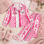 pink checkered ribbon satin pajamas flat lay with a custom name on the chest