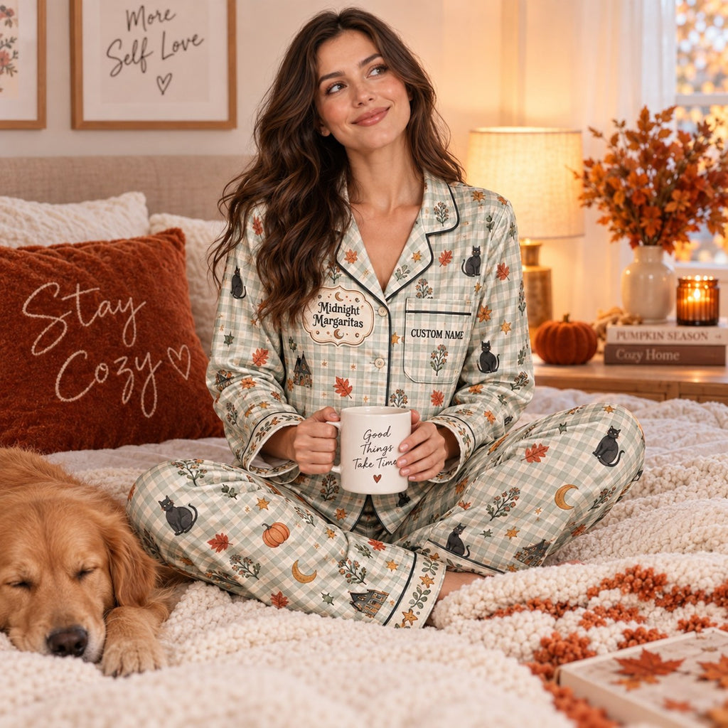 woman in pajamas holding a good witches only mug