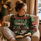woman relaxing in ugly christmas sweater with tired christmas quote and reading