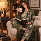 woman in a bedroom holding a book, wearing the haunted library satin