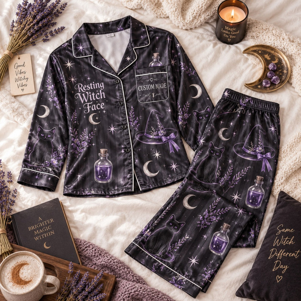 flat lay black satin pajama set with purple lavender, potions and crescent moons