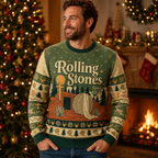 smiling man in a rolling stones merry christmas sweater by tree