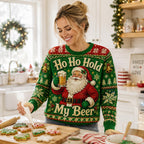 woman piping icing on christmas cookies in a matching green santa ugly