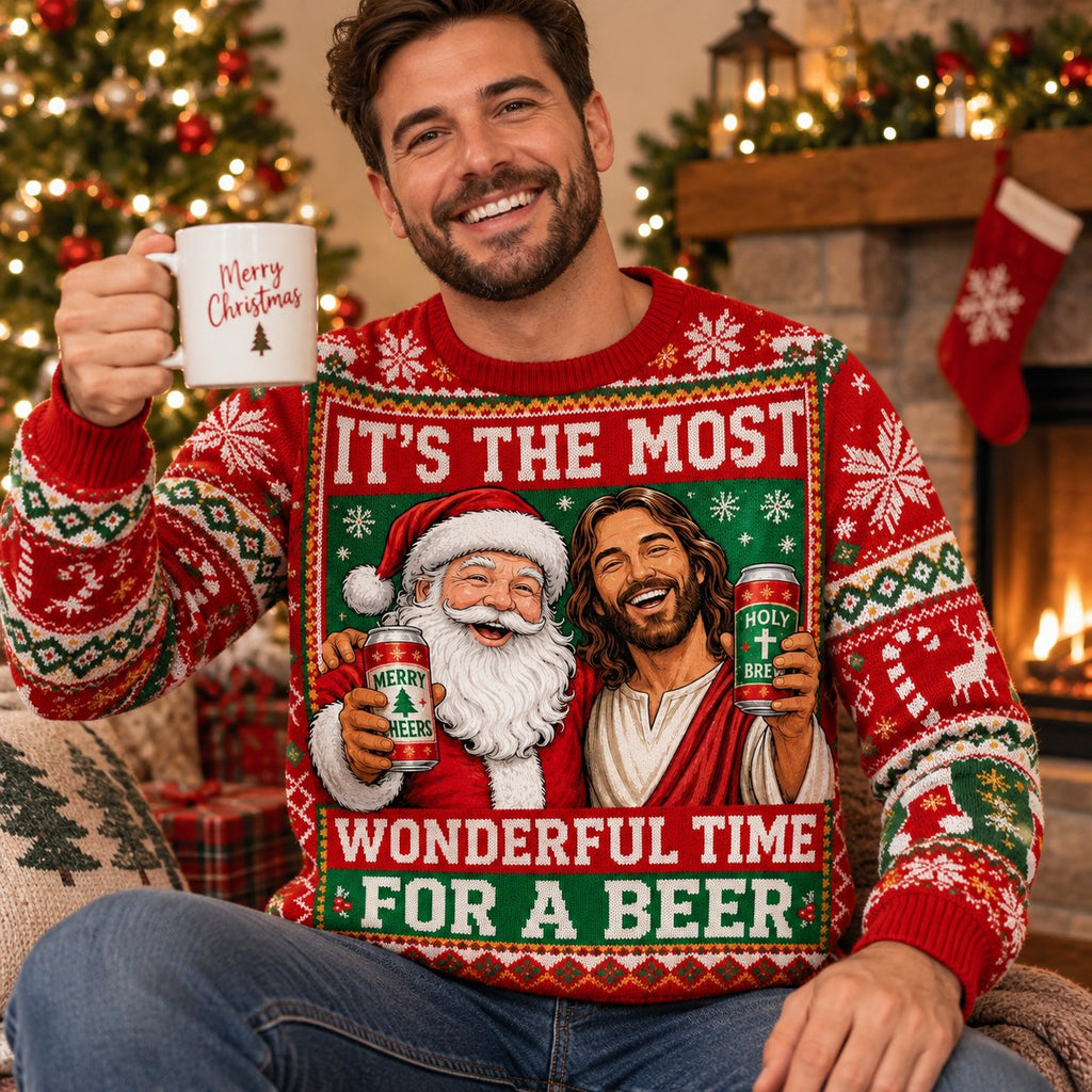 Man in Santa and ugly christmas sweater holding a Merry Christmas mug
