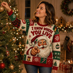 woman reaching up to hang a bauble on a christmas tree in