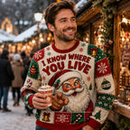 man smiling with a hot drink at a snowy christmas market wearing