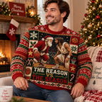 ugly christmas sweater worn by a man sitting by a lit tree