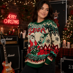 woman wearing a knit ugly christmas sweater with santa playing guitar in