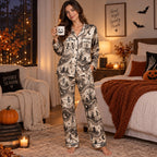 back view of the satin pajama set showing skeleton dance print