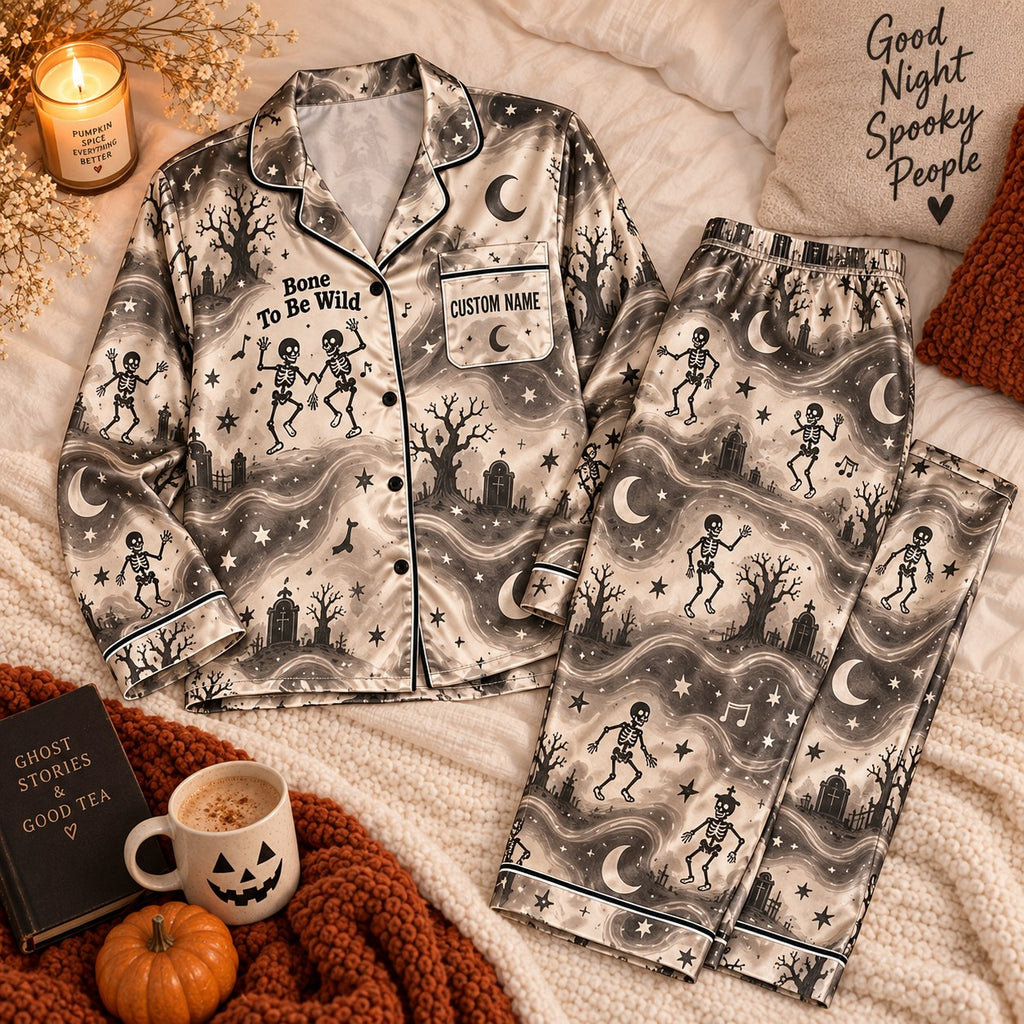 gray dancing skeleton satin pajamas flat lay with a custom name on the chest