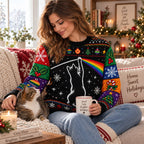 woman sitting on a couch holding a cat while wearing a cat