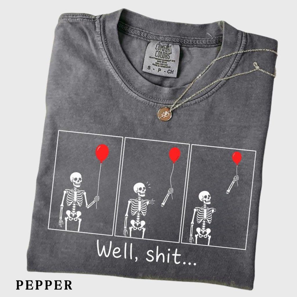 folded pepper grey graphic tee with skeleton and red balloon comic print