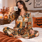 halloween satin pajama set worn on bed with pumpkin mug and happy